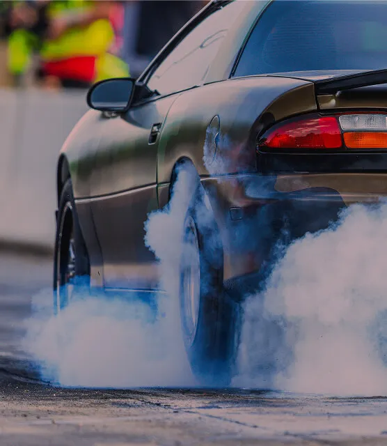 drag-racer-smoking-tires