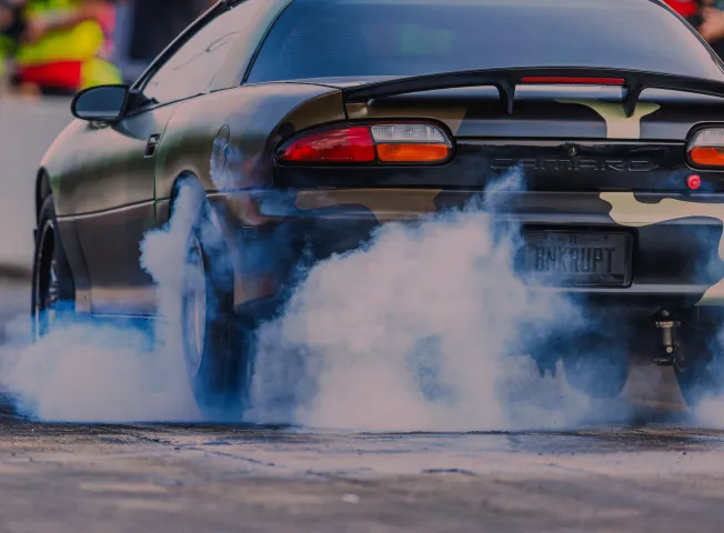drag-racer-smoking-tires