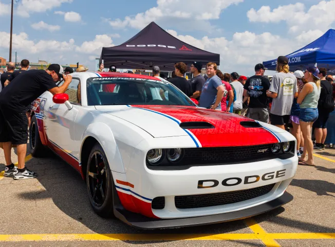 enthusiast-looks-into-direct-connection-car-window
