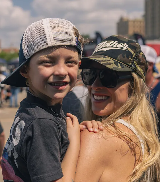 mother-holding-smiling-son