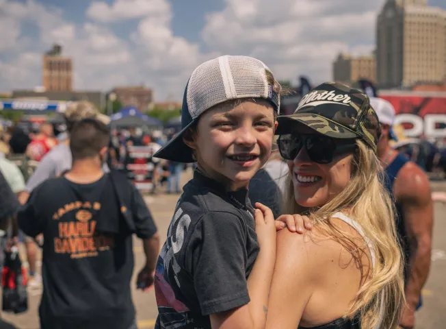 mother-holding-smiling-son